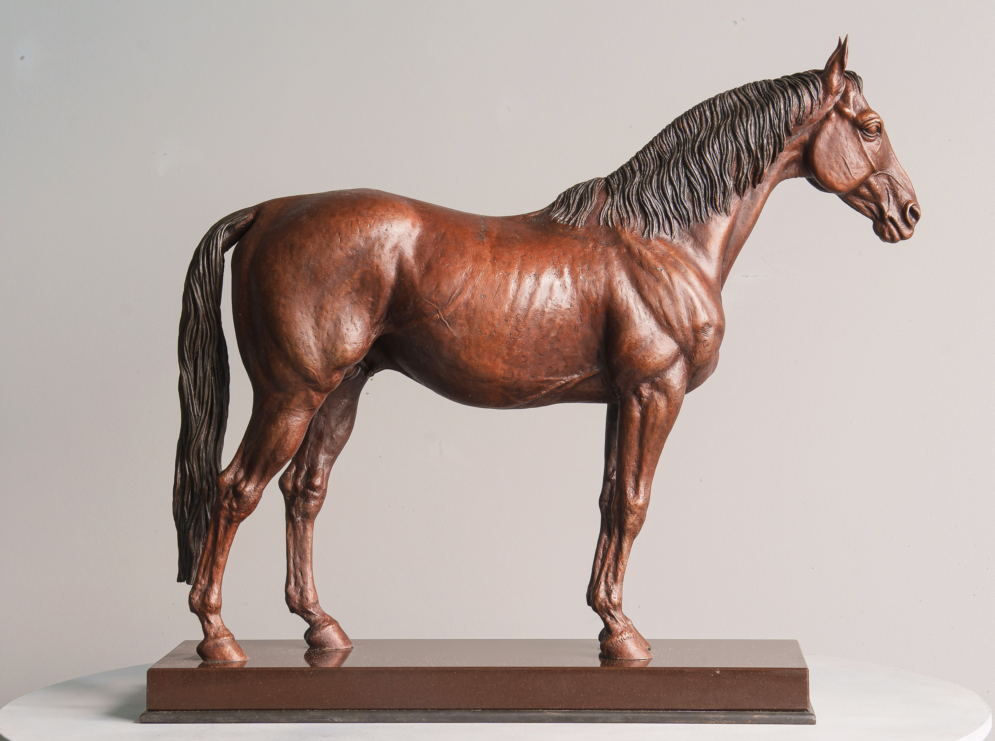 Red horse, bronze sculpture by Sergey Bondarenko — front view